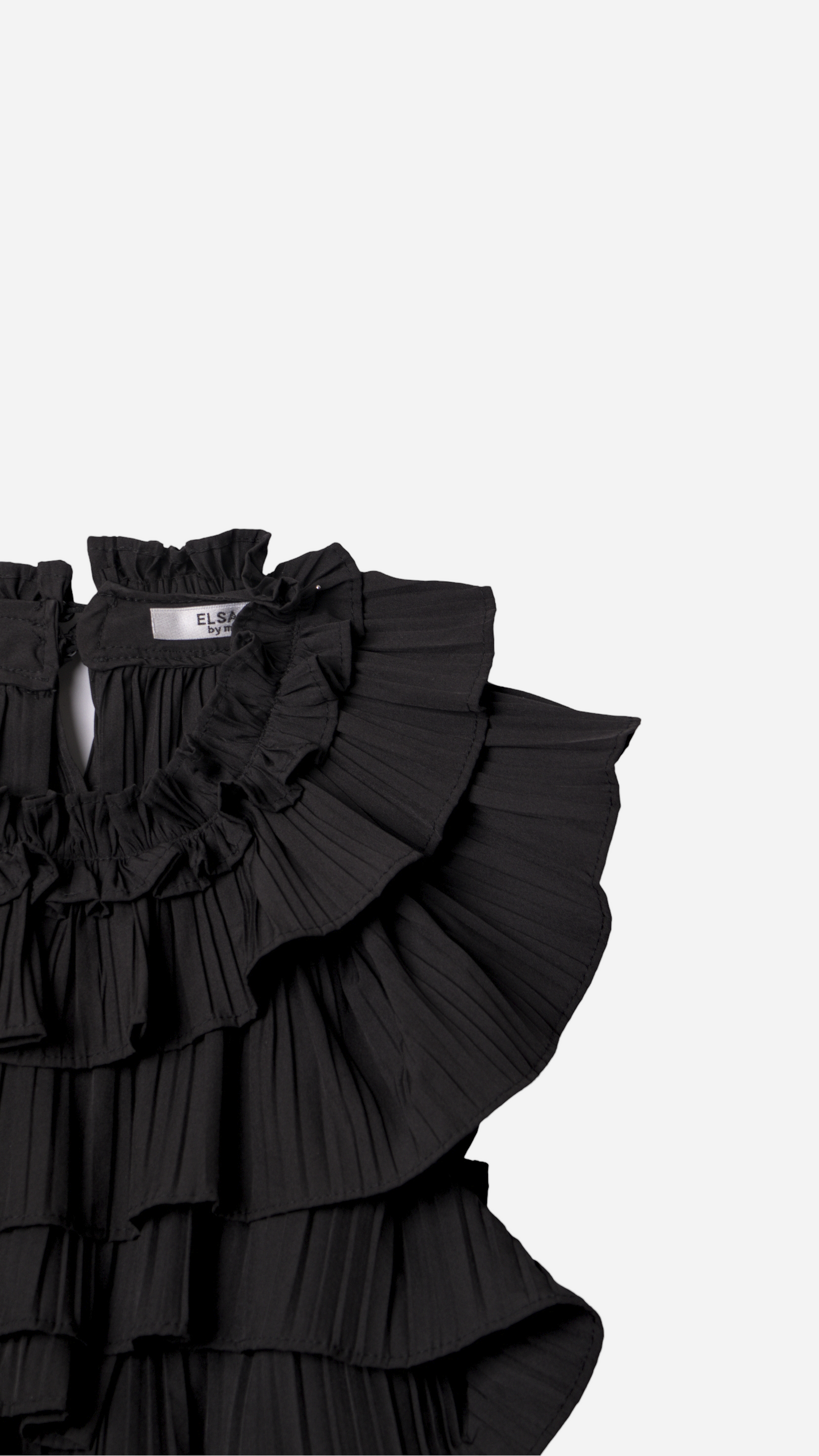 TOP WITH RUFFLES AND BACKLESS
