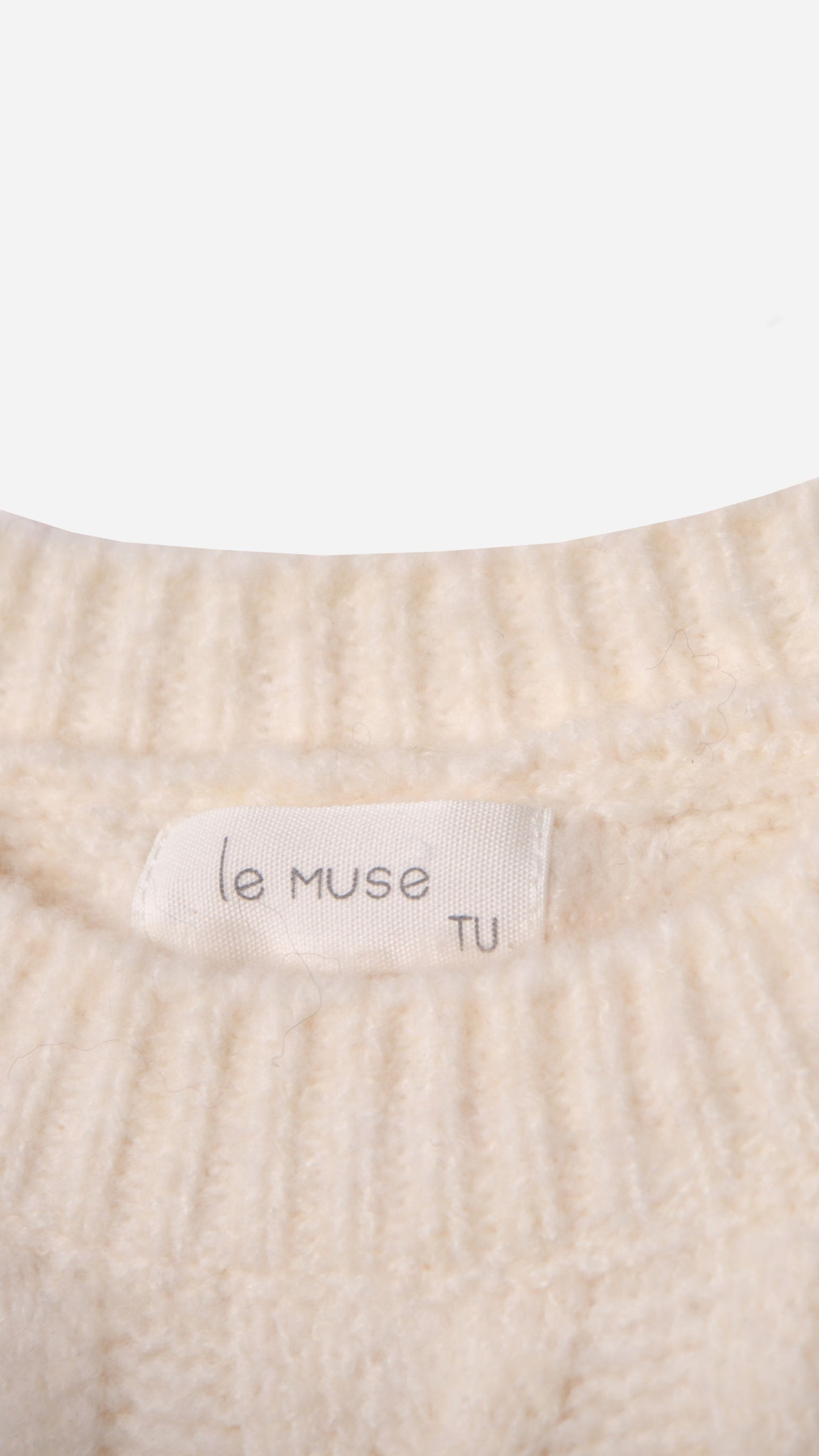 SOFT KNITTED JERSEY WITH BRAIDS