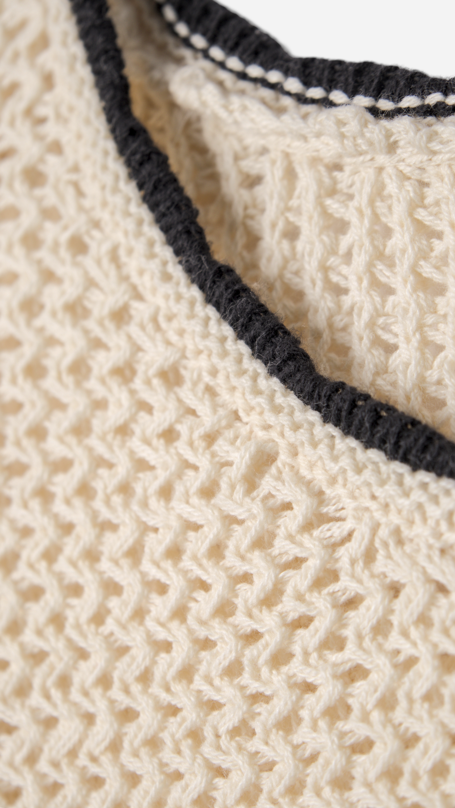 COMBINED KNITTED JERSEY WITH RUFFLED SHOULDERS