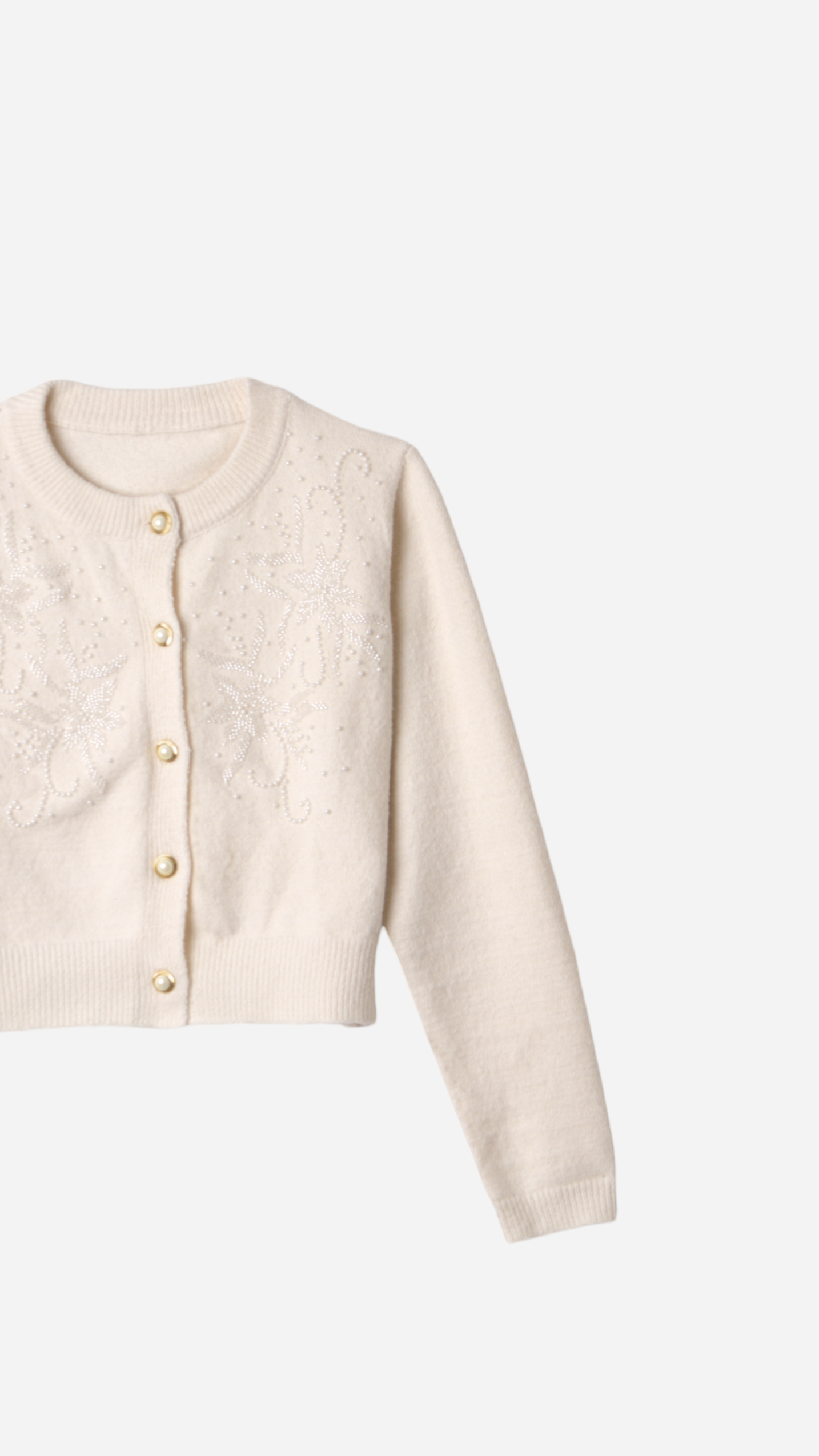 JERSEY WITH BUTTONS AND FLOWER DETAILS
