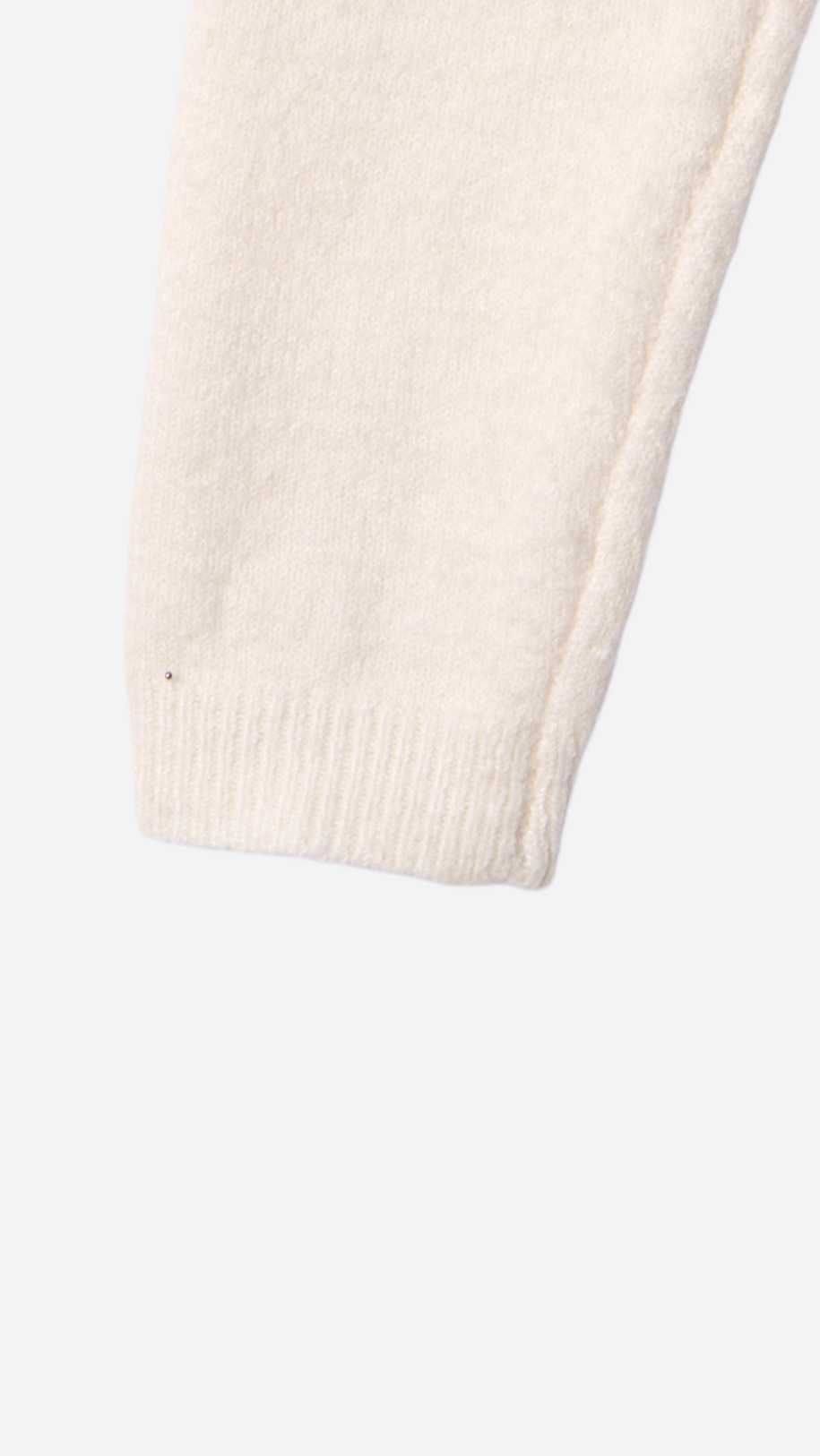 JERSEY WITH BUTTONS AND FLOWER DETAILS