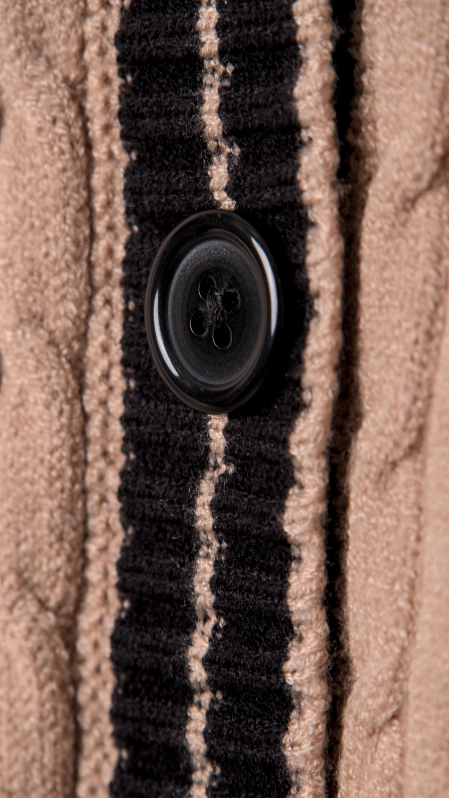 KNITTED SWEATER WITH EMBOSSED BUTTONS AND V-NECK