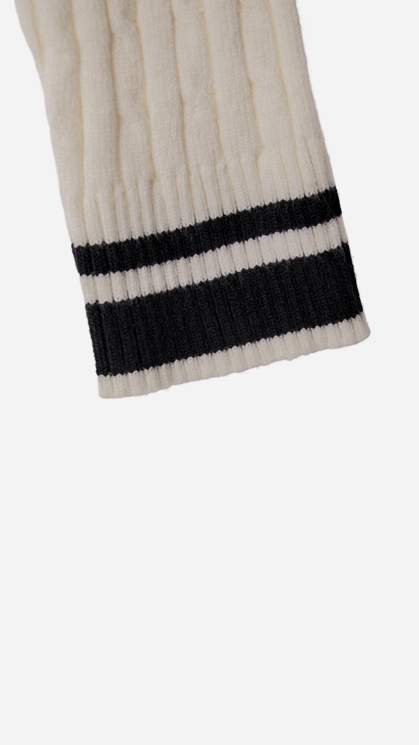 KNITTED SWEATER WITH EMBOSSED BUTTONS AND V-NECK