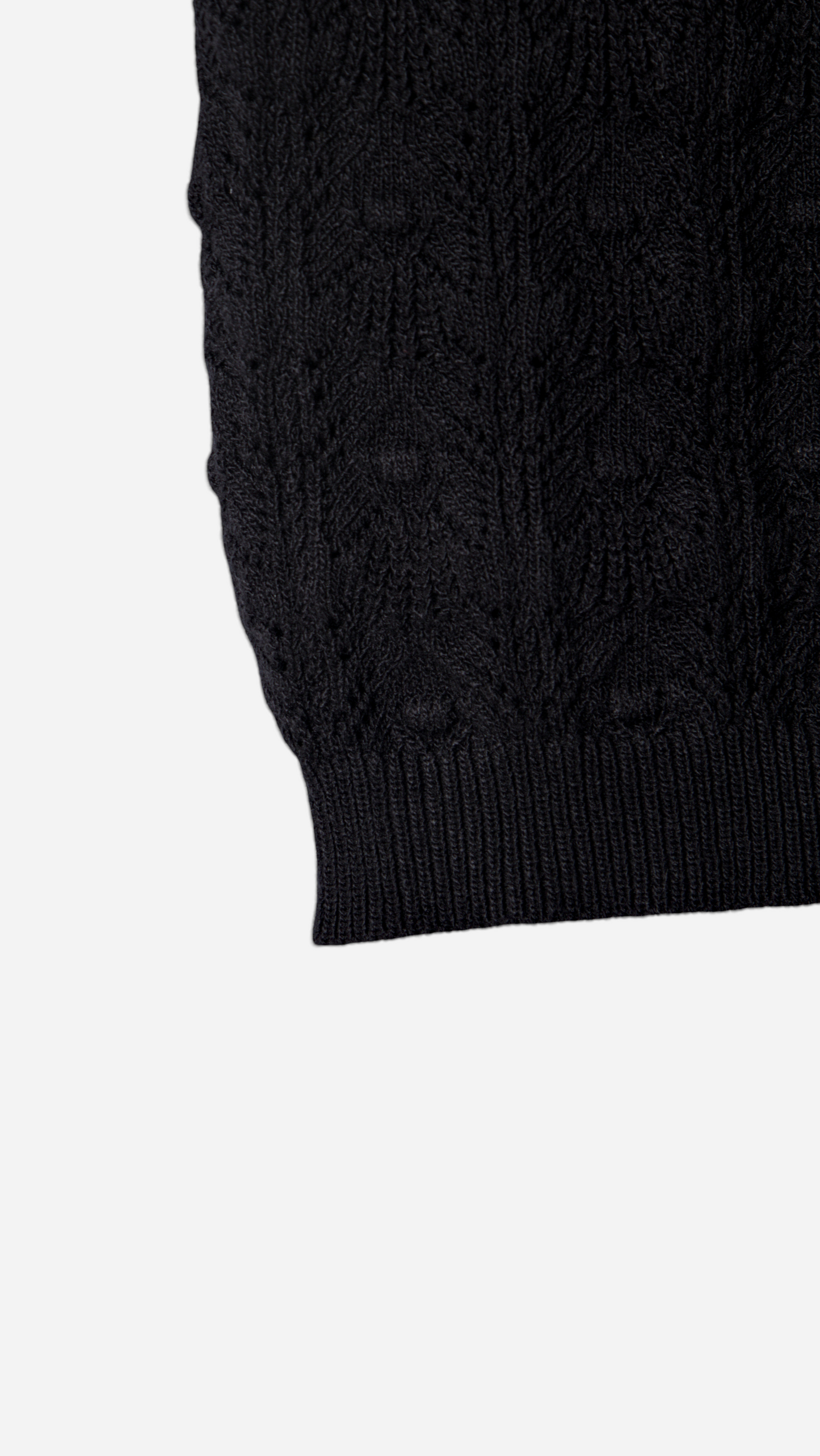 KNITTED TOP WITH BUTTON STRAPS