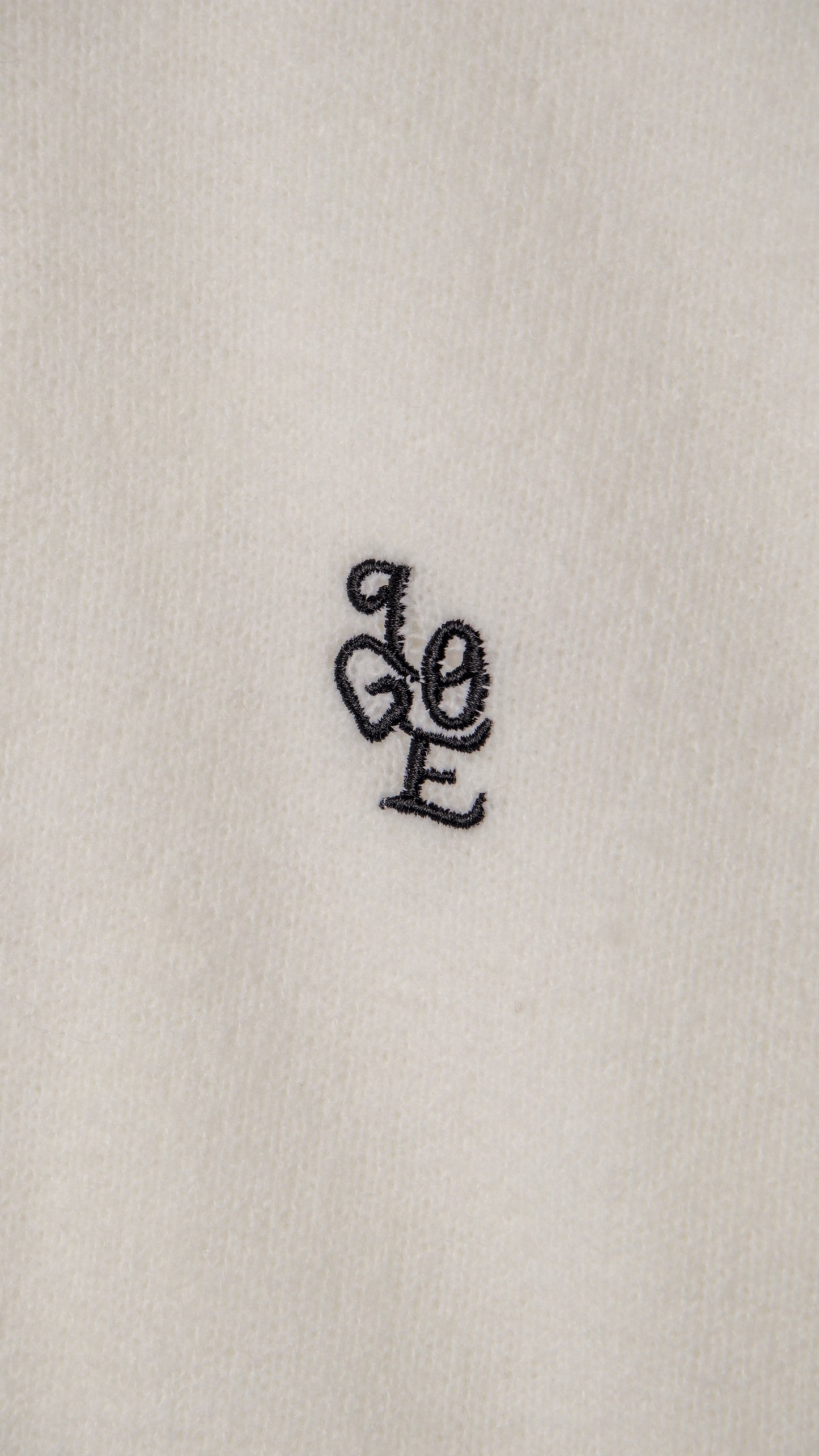 LOVE EMBROIDERED KNITTED JERSEY