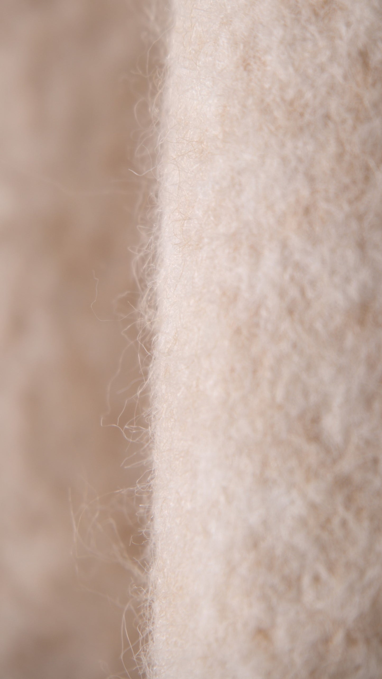 KNITTED JERSEY WITH SHOULDER CLOSURE