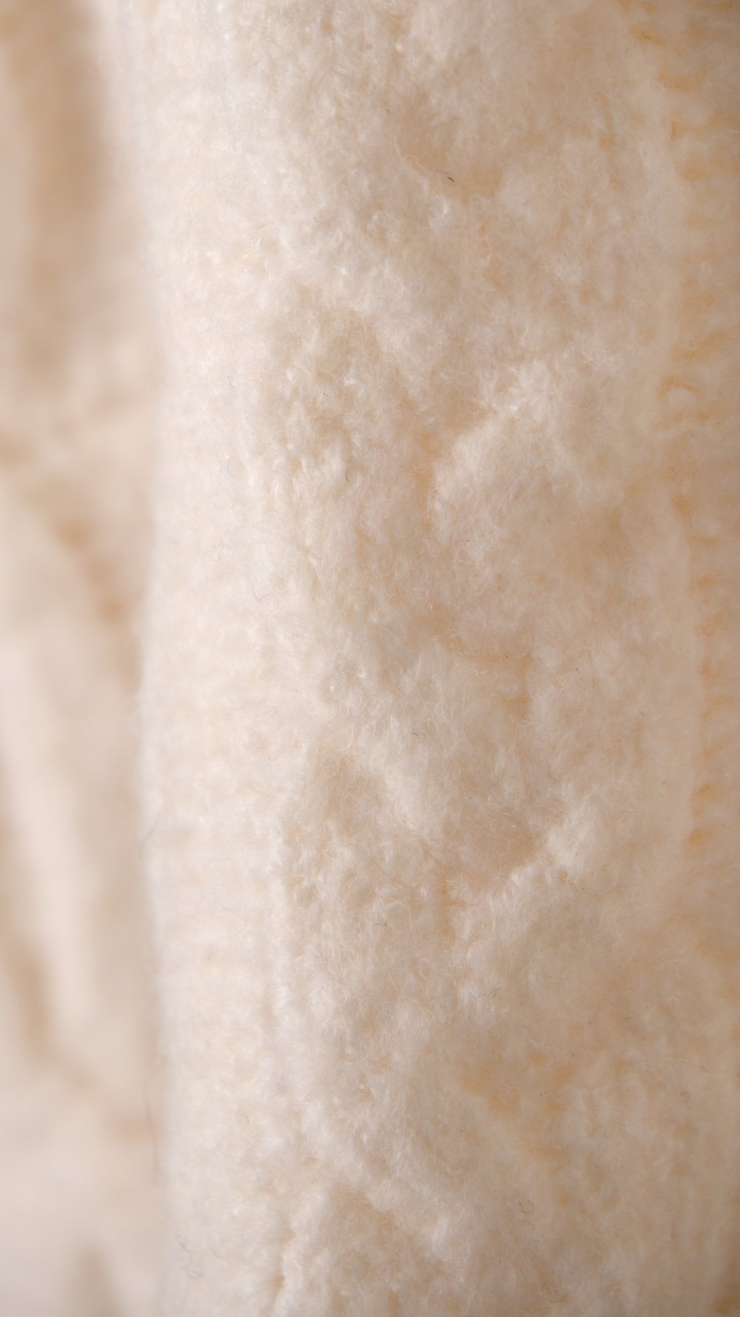 SOFT KNITTED JERSEY WITH BRAIDS